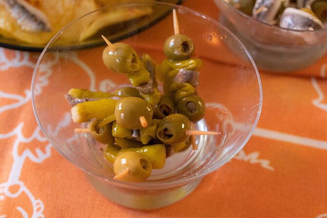 Any Day is Sunday: Paella Cooking Class with Tapas and Sangria - Preparing authentic Valencian paella