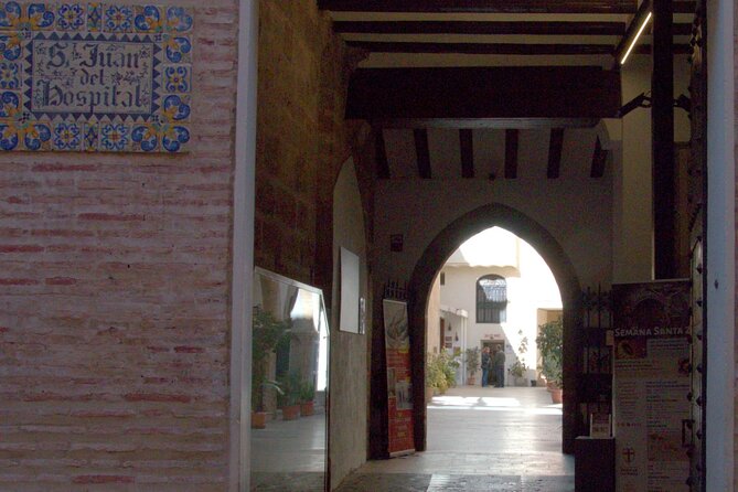 Between Two Gates: A Self-Guided Audio Tour in Valencia - Plaça de Dècim Juni Brut and Valencia’s layered past