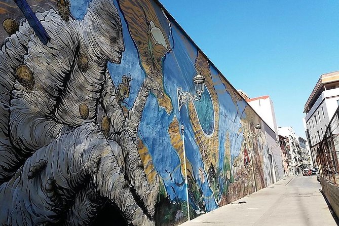 Grafiti tour and Carmen Quarter - Medieval walls beside modern murals