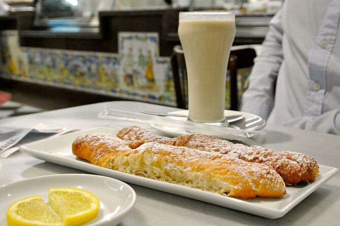 Highlights of Valencia Half-Day Private Tour with Local Tasting - Circular Plaza Redonda and Baroque Valencia