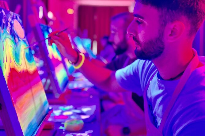 Paint a neon fluorescent picture while drinking unlimited wine - Starting at Carrer del Bisbe Jaume Pérez