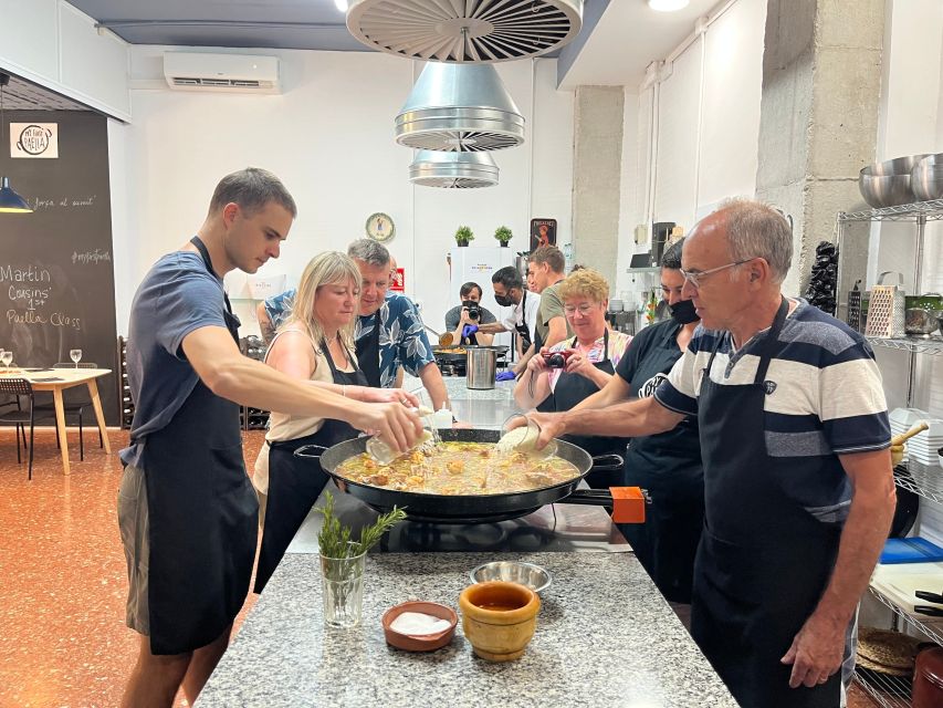 Real Paella Cooking Class – Market Visit & Sangría Workshop - Rolling up your sleeves for the paella