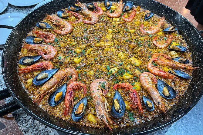 Seafood paella cooking class, tapas and visit to Ruzafa market. - Price, Group Size, and Overall Value