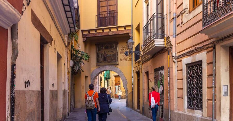 Small-Group Medieval Valencia Walking Tour - Licensed Guide - Portal de Valldigna and the city’s layered past
