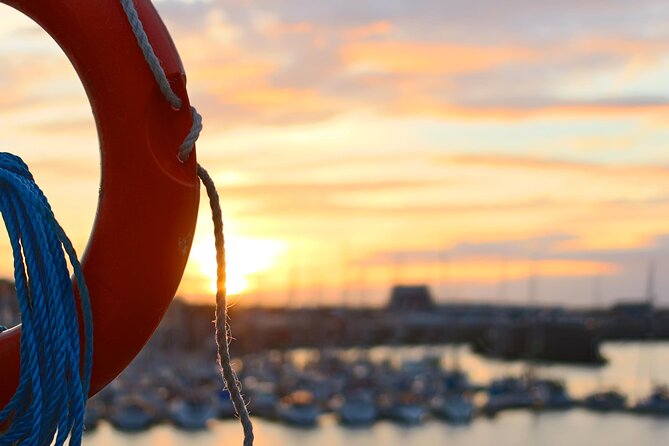 Sunset in Valencia from the Catamaran Mundo Marino - The nets are fun, but plan for spray