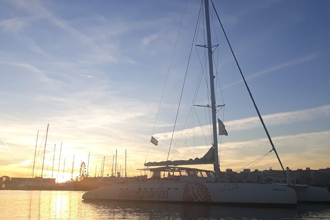 Sunset in Valencia from the Catamaran Mundo Marino - Malvarrosa Beach and the first coastal views