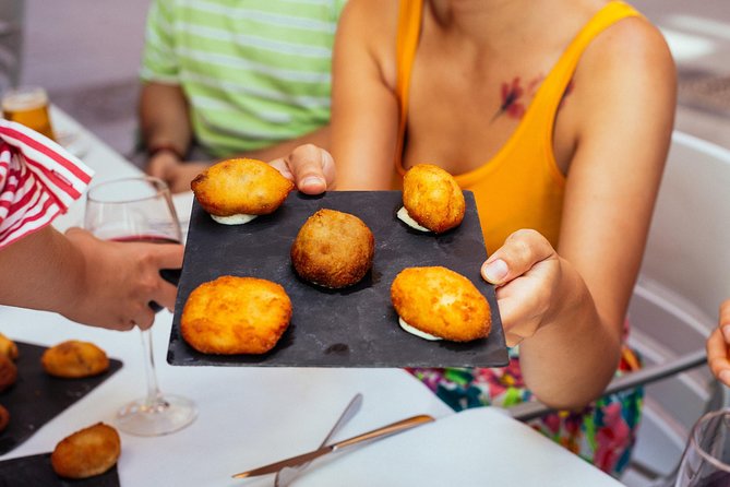 The 10 Tastings of Valencia With Locals: Private Food Walking Tour - Plaza del Ayuntamiento, Valencia’s grand front door