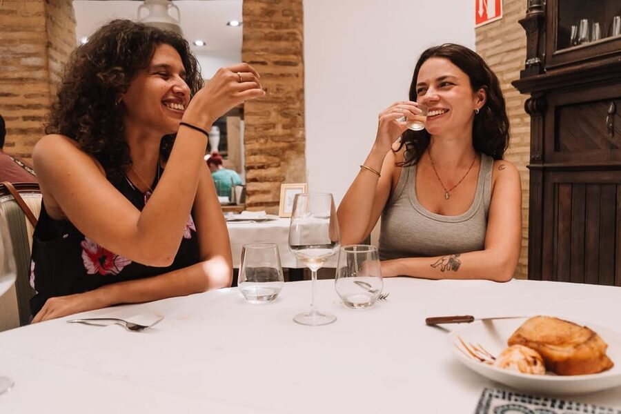 Valencia: Authentic Food Tour with Paella Valenciana - The walk past Torres de Serranos