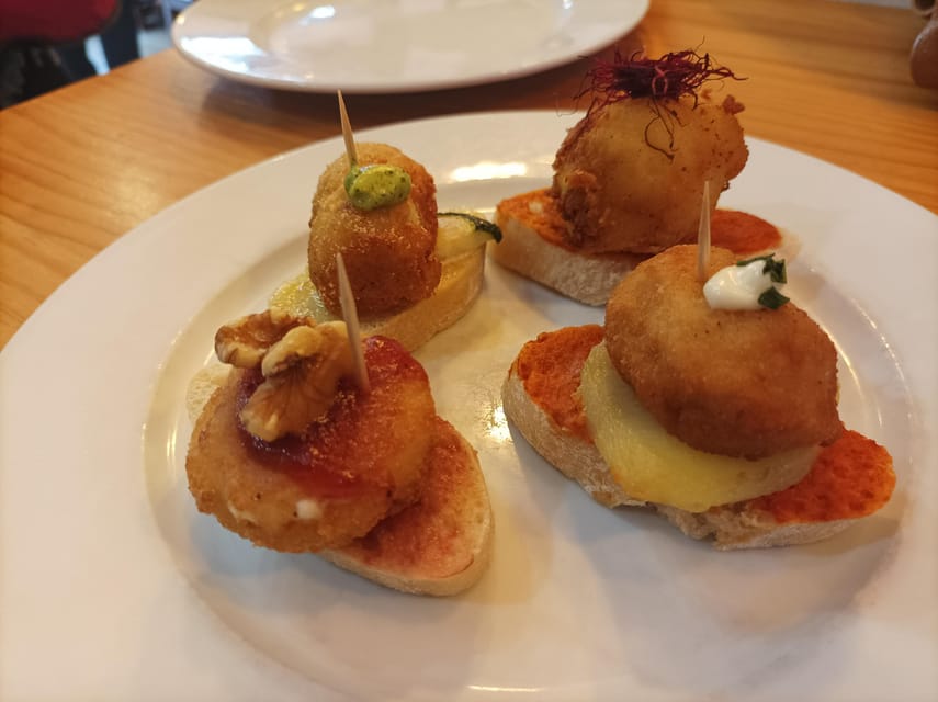Valencia: Authentic Tapas & Drinks with a Local - Clóchinas at a traditional Valencian bar