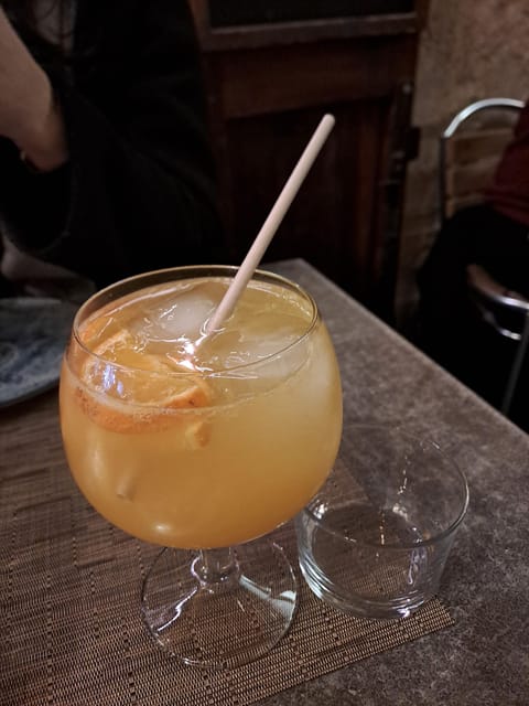 Valencia: Authentic Tapas & Drinks with a Local - Agua de Valencia after dark