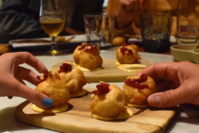 Valencia Centre Food Tour with 9+ Tastings of Regional Delicacies - Stop three: mussels and a regional delicatessen