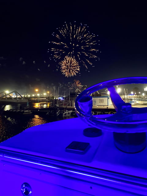 Valencia: Night Cruise with Free Drink - Veles e Vents and the waterfront buildings