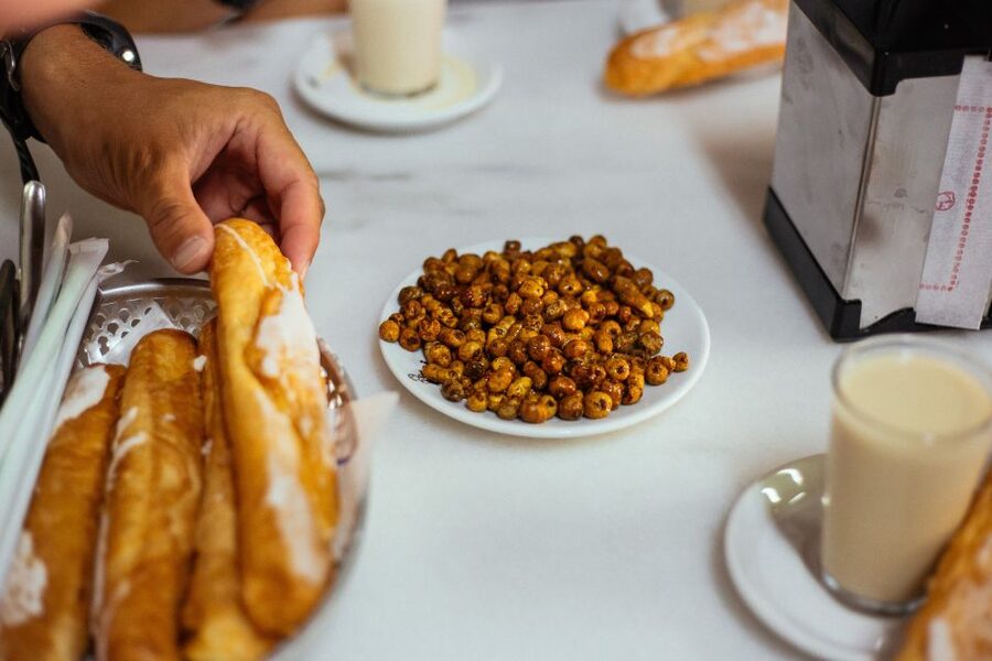 Valencia: Private Food Tour – 10 Tastings with Locals - Valencia on a plate, with the old city between stops
