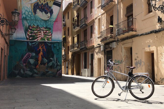 Valencia Street Art | Private Tour by Bike or Electric Ride - Timing, weather, and the return to Carrer de l’Herba