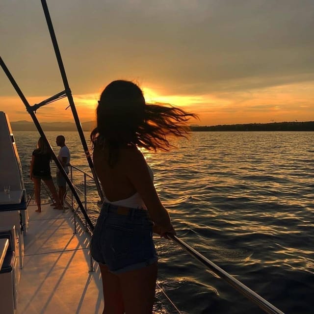 Valencia: Sunset or Daytime Catamaran Cruise with Drink - Open water, coastal views, and a little rocking